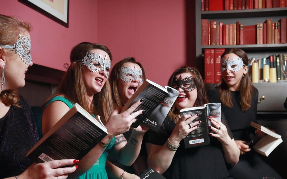 A book group enjoy Fifty Shades Darker by E L James - PA