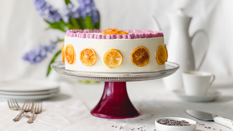 Bright and sunny lemon lavender cake on cake stand