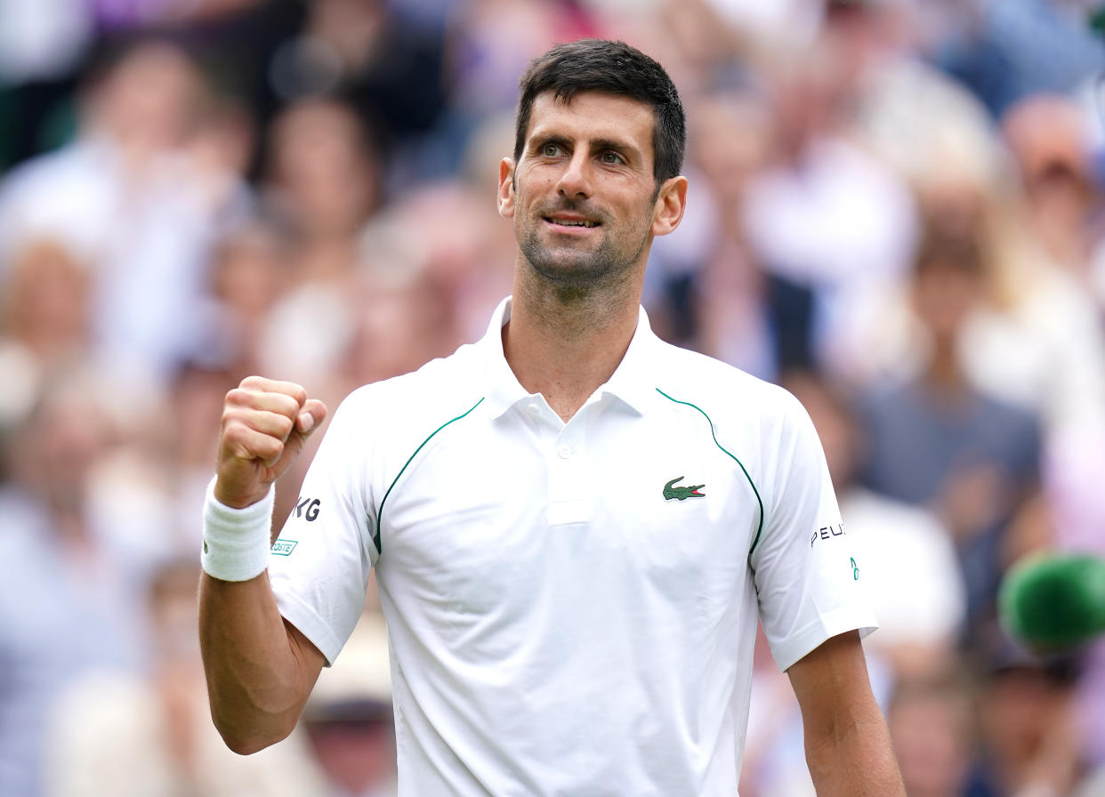 Novak Djokovic celebrates winning against Marton Fucsovics in the quarter-final men's single match on centre court on day nine of Wimbledon at The All England Lawn Tennis and Croquet Club, Wimbledon. Picture date: Wednesday July 7, 2021. (Photo by Adam Davy/PA Images via Getty Images)