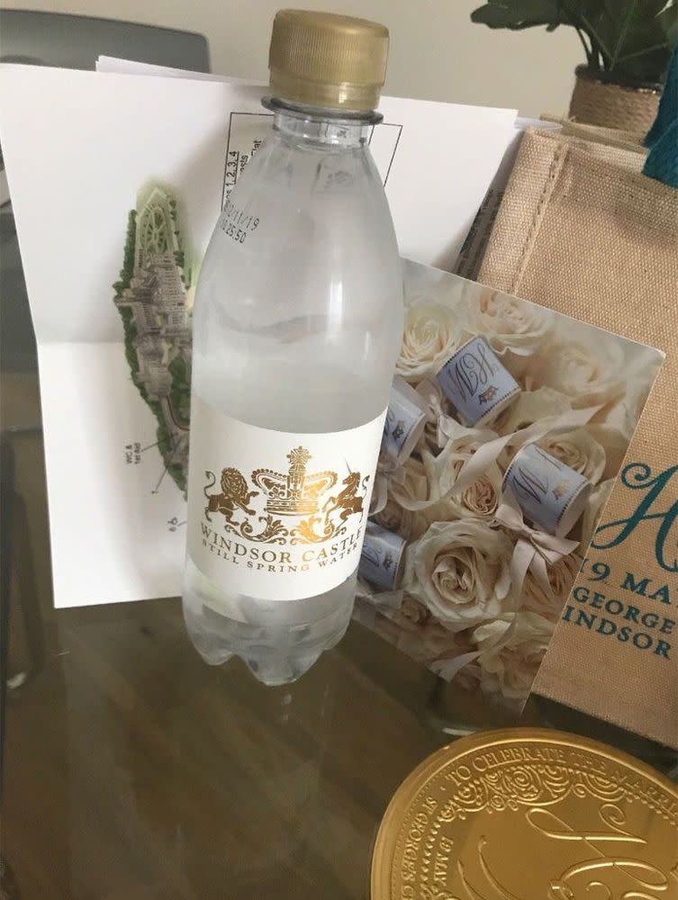 A water bottle featuring a royal monogram and the location of Prince Harry and Meghan Markle's wedding