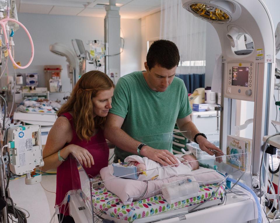 Elizabeth and Tristan Holbrook spend time with their newborn daughter Grace, Rady Children’s Hospital, San Diego, CA, July 18, 2017