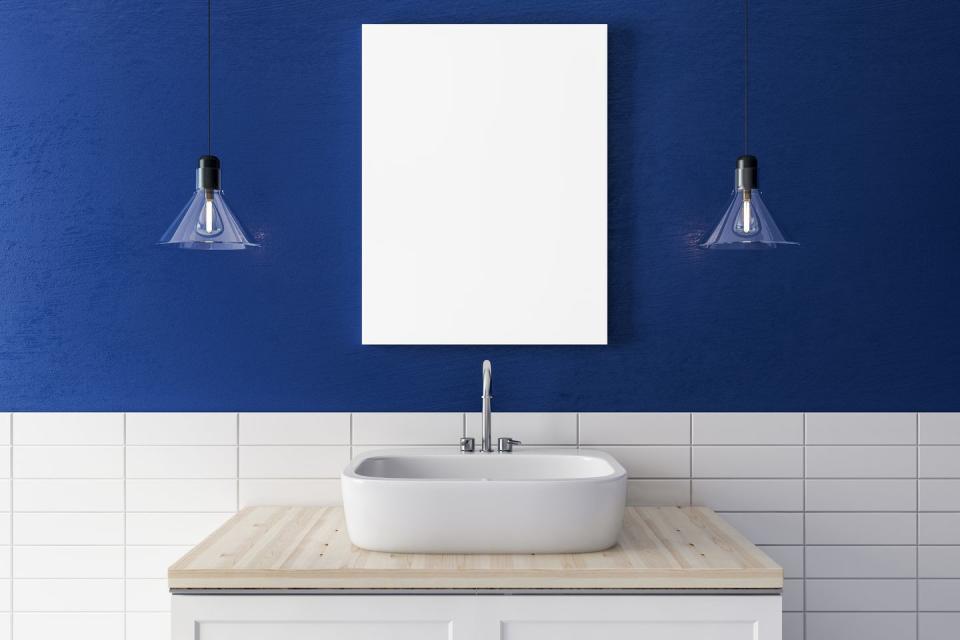 close up of sink and lamps on blue wall background with empty poster mock up, 3d rendering