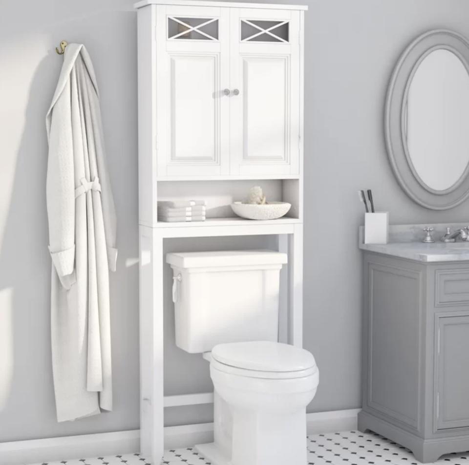 Towels, toilet paper and other bathroom essentials will finally have a sleek storage space.<br /><strong><br />Promising review:</strong> "Love this cabinet and the detail on cabinet doors and handles! Also love the MUCH NEEDED spacious shelves since I'm downsizing to a smaller space with no under sink storage." &mdash; <a href="https://go.skimresources.com?id=38395X987171&amp;xs=1&amp;xcust=-HPWayDaySale4-28-21-60896f93e4b09cce6c197126&amp;url=https%3A%2F%2Fwww.wayfair.com%2Fstorage-organization%2Fpdp%2Frosecliff-heights-roberts-25-w-x-6825-h-x-8-d-over-the-toilet-storage-w005062840.html" target="_blank" rel="noopener noreferrer">Tia</a><br /><br /><strong>Price:</strong> <a href="https://go.skimresources.com?id=38395X987171&amp;xs=1&amp;xcust=-HPWayDaySale4-28-21-60896f93e4b09cce6c197126&amp;url=https%3A%2F%2Fwww.wayfair.com%2Fstorage-organization%2Fpdp%2Frosecliff-heights-roberts-25-w-x-6825-h-x-8-d-over-the-toilet-storage-w005062840.html" target="_blank" rel="nofollow noopener noreferrer" data-skimlinks-tracking="5938996" data-vars-affiliate="CJ" data-vars-campaign="31WaydaySale-Hernandez-04-28-21-5938996/https://www.wayfair.com/storage-organization/pdp/rosecliff-heights-roberts-25-w-x-6825-h-x-8-d-over-the-toilet-storage-w005062840.html?piid=830308719" data-vars-href="https://www.anrdoezrs.net/links/8209452/type/dlg/sid/31WaydaySale-Hernandez-04-28-21-5938996/https://www.wayfair.com/storage-organization/pdp/rosecliff-heights-roberts-25-w-x-6825-h-x-8-d-over-the-toilet-storage-w005062840.html?piid=830308719" data-vars-keywords="cleaning" data-vars-link-id="16676868" data-vars-price="" data-vars-product-id="21102549" data-vars-product-img="https://secure.img1-fg.wfcdn.com/im/47771470/resize-h800-w800%5Ecompr-r85/4167/41675499/Roberts+25%2522+W+x+68.25%2522+H++x+8%2522+D+Over+The+Toilet+Storage.jpg" data-vars-product-title="Roberts 25&quot; W x 68.25&quot; H x 8&quot; D Over The Toilet Storage" data-vars-redirecturl="https://www.wayfair.com/storage-organization/pdp/rosecliff-heights-roberts-25-w-x-6825-h-x-8-d-over-the-toilet-storage-w005062840.html?piid=830308719" data-vars-retailers="wayfair" data-ml-dynamic="true" data-ml-dynamic-type="sl" data-orig-url="https://www.anrdoezrs.net/links/8209452/type/dlg/sid/31WaydaySale-Hernandez-04-28-21-5938996/https://www.wayfair.com/storage-organization/pdp/rosecliff-heights-roberts-25-w-x-6825-h-x-8-d-over-the-toilet-storage-w005062840.html?piid=830308719" data-ml-id="15">$106.99</a> (originally $224.99; available in two colors)<br /><br /><i>See more storage and organization products <a href="https://go.skimresources.com?id=38395X987171&amp;xs=1&amp;xcust=-HPWayDaySale4-28-21-60896f93e4b09cce6c197126&amp;url=https%3A%2F%2Fwww.wayfair.com%2Fdaily-sales%2Fway-day%253a-storage-%2526-organization%7Ee220854.html" target="_blank" rel="noopener noreferrer">from $9.99</a>.</i>