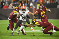 Cleveland Browns wide receiver Elijah Moore runs against the Washington Commanders during the first half of a preseason NFL football game on Friday, Aug. 11, 2023, in Cleveland. (AP Photo/David Richard)