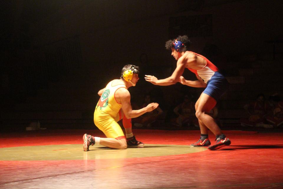 Rocky Ford's Jaden Huerta eyes an opening last Wednesday against Buena Vista's Chris Deluca in their 170 pound match. Deluca narrowly defeated Huerta, 8-5.