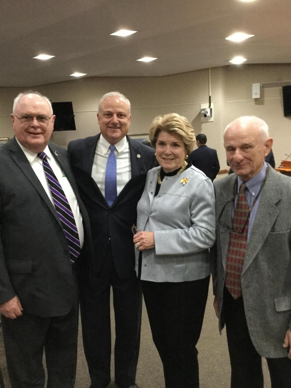 State Rep. Mel Ponder, second from left, stands with Charlotte Flynt, widow of the late Air Force Col. Michael Flynt, and Dr. Eddie Zant, left, as Zant and the late colonel were inducted into the Florida Veterans' Hall of Fame. With them is retired Army Reserve Brig. Gen. Patt Maney, who was inducted into the Hall of Fame in 2018. Michael Flynt is one of nine Okaloosa County veterans being honored this month for his induction into the Florida Veterans Hall of Fame.