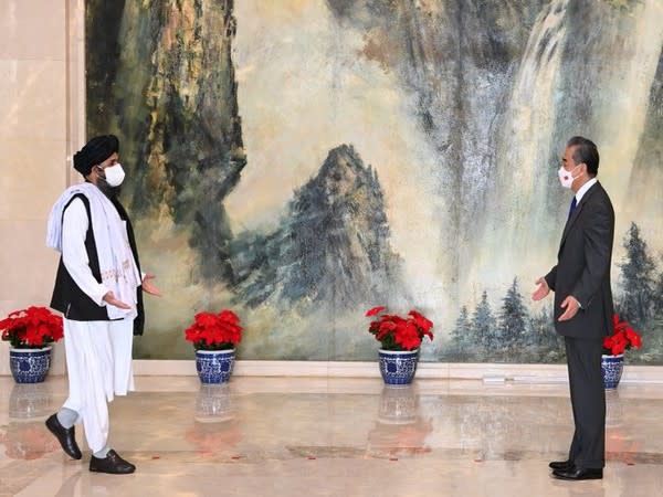 Chinese foreign minister Wang Yi meets with Head of the Afghan Taliban Political Commission Mullah Abdul Ghani Baradar