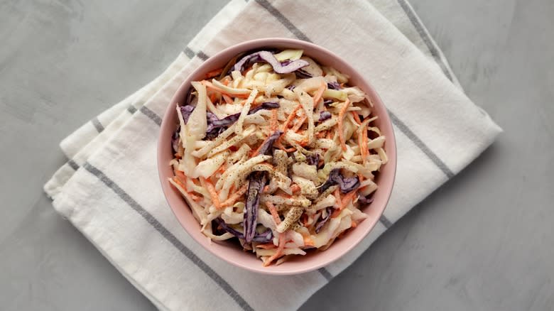 Southern coleslaw in pink bowl