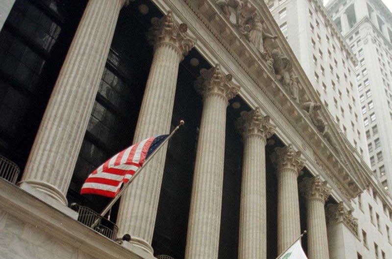 A herd of bulls run past the New York Stock Exchange to celebrate the first day of trading on January 5, 1998, of consumer foods giant Bestfoods, formerly CPC International. On March 8, 1817, the New York Stock Exchange was established. File Photo by Jason Szenes/UPI