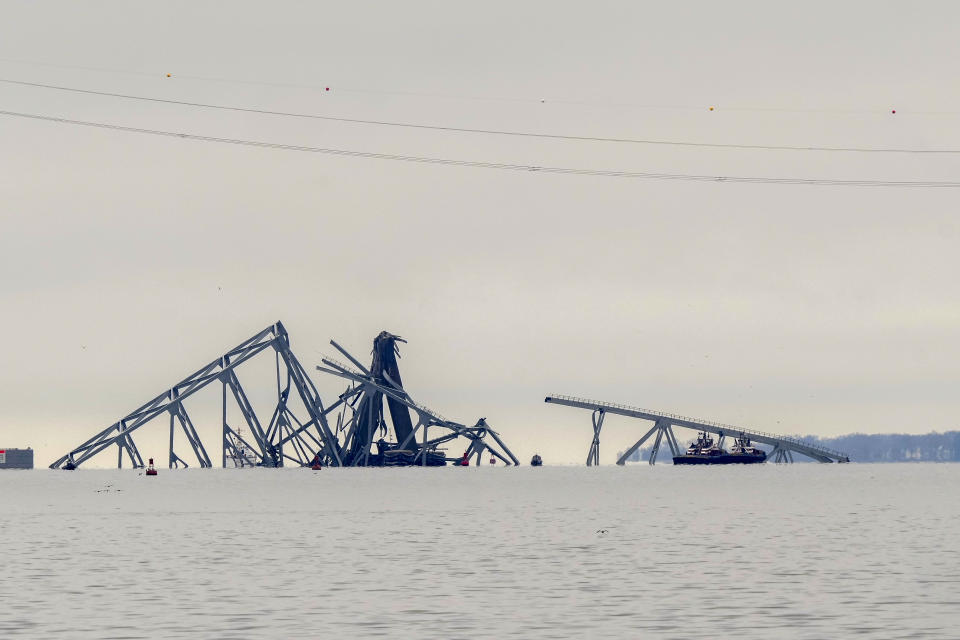 Wreckage of the Francis Scott Key Bridge is pictured on Wednesday, March 27, 2024, in Baltimore. A cargo ship rammed into the major bridge Tuesday, causing it to collapse in a matter of seconds and creating a terrifying scene as several vehicles plunged into the chilly river below. (AP Photo/Matt Rourke)