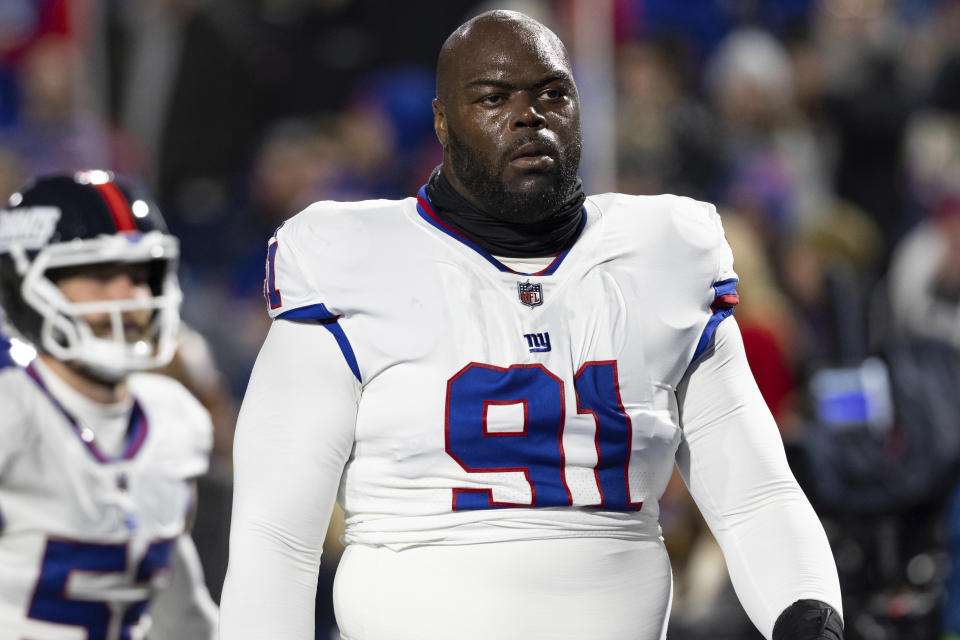 FILE - New York Giants defensive tackle A'Shawn Robinson (91) walks off the field before the team's NFL football game against the Buffalo Bills on Oct. 15, 2023, in Orchard Park, N.Y. The Carolina Panthers bolstered their defense Tuesday, agreeing on contracts with Robinson and linebacker Josey Jewell, two people with knowledge of the deals told The Associated Press. (AP Photo/Matt Durisko, File)