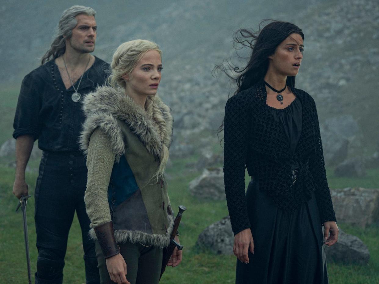 Henry Cavill, Freya Allan and Anya Chalotra in "The Witcher" season three.