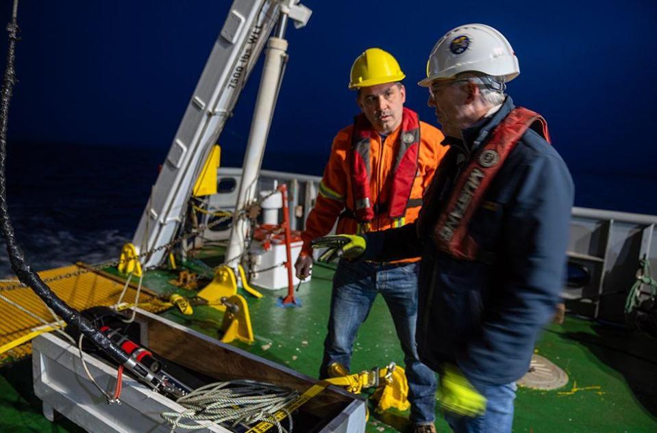 The team prepares to launch the side-scan sonar to search for Quest