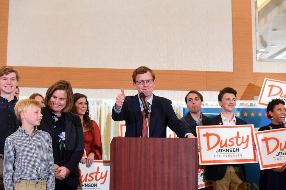 U.S. Representative Dusty Johnson gives a thumbs-up to a supporter as he takes the stage at an election night watch party on Tuesday, June 7, 2022, at the Hilton Garden Inn in Sioux Falls.