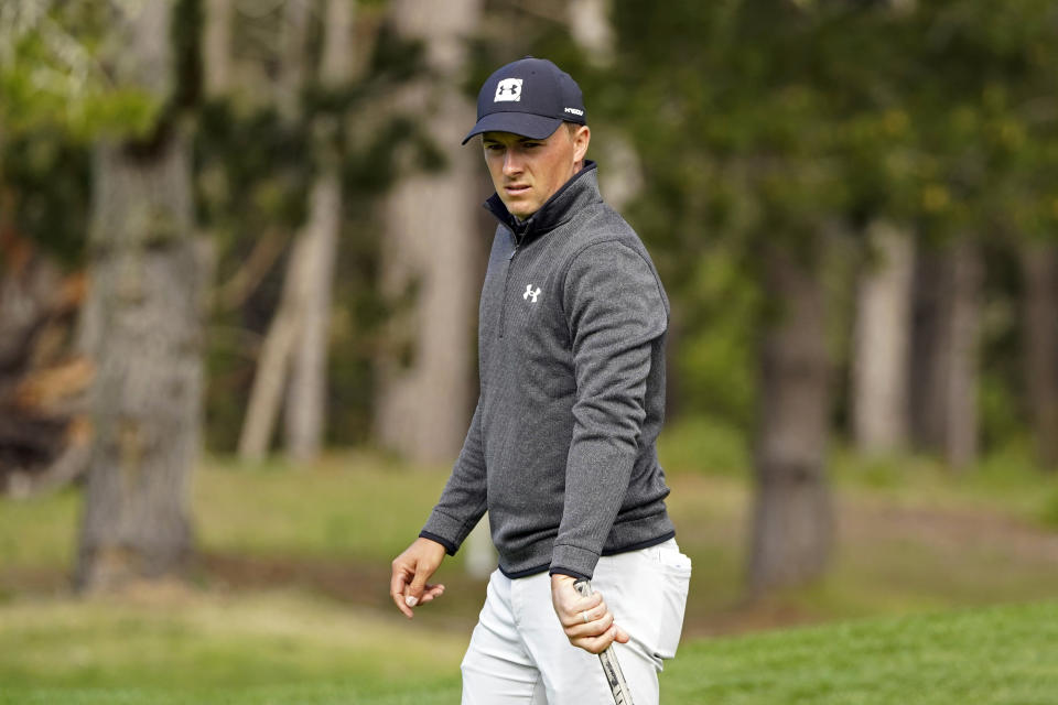 Jordan Spieth reads the sixth green of the Spyglass Hill Golf Course during the second round of the AT&T Pebble Beach Pro-Am golf tournament Friday, Feb. 12, 2021, in Pebble Beach, Calif. (AP Photo/Eric Risberg)