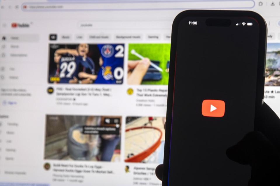 PHOTO: Youtube is displayed on mobile phone. (Mehmet Futsi/Anadolu via Getty Images)