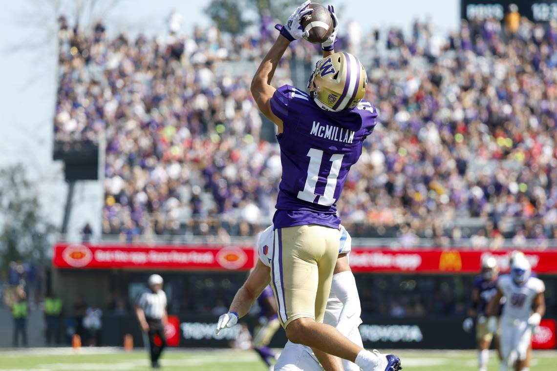 Sep 2, 2023; Seattle, Washington, USA; Washington Huskies wide receiver Jalen McMillan (11) catches a touchdown pass against the Boise State Broncos during the second quarter at Alaska Airlines Field at Husky Stadium. Mandatory Credit: Joe Nicholson-USA TODAY Sports Joe Nicholson/USA TODAY NETWORK