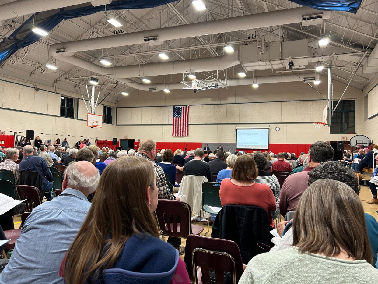 About 400 people attended the first night of Harwich town meeting on Monday. The meeting will continue at 7 p.m. on Tuesday at the community center at 100 Oak St.