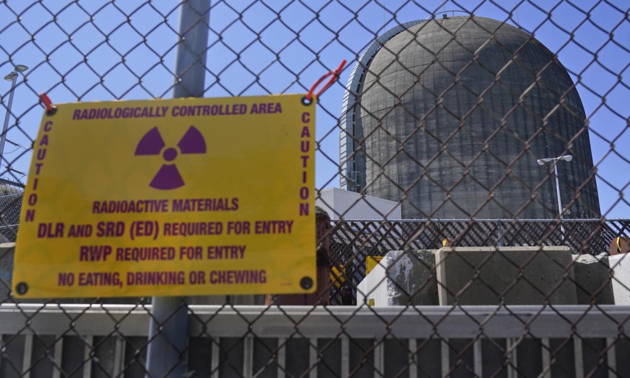 <span>In this 26 April 2021 photo, a sign on a fence warns of radioactive materials at the Indian Point nuclear power plant in Buchanan, New York. The plant is now closed.</span><span>Photograph: Seth Wenig/AP</span>