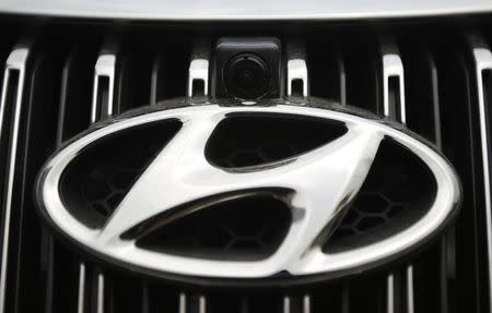 A vehicle camera is installed on the front grill of a Hyundai Motors' Grandeur sedan at Hyundai Mobis Research Centre in Yongin, in this file photo taken July 16, 2014. REUTERS/Kim Hong-Ji/Files