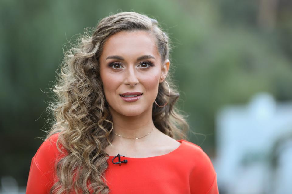 Close up of Alexa PenaVega in red dress