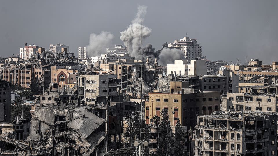 Smoke rises following an Israeli airstrike in Gaza City on Thursday. - Ali Jadallah/Anadolu/Getty Images