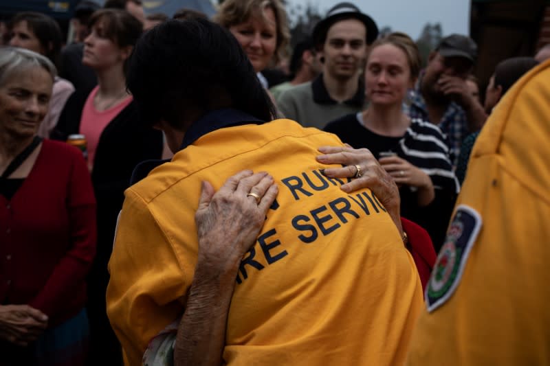 The Wider Image: From Australian bushfire ashes, a community rises in solidarity