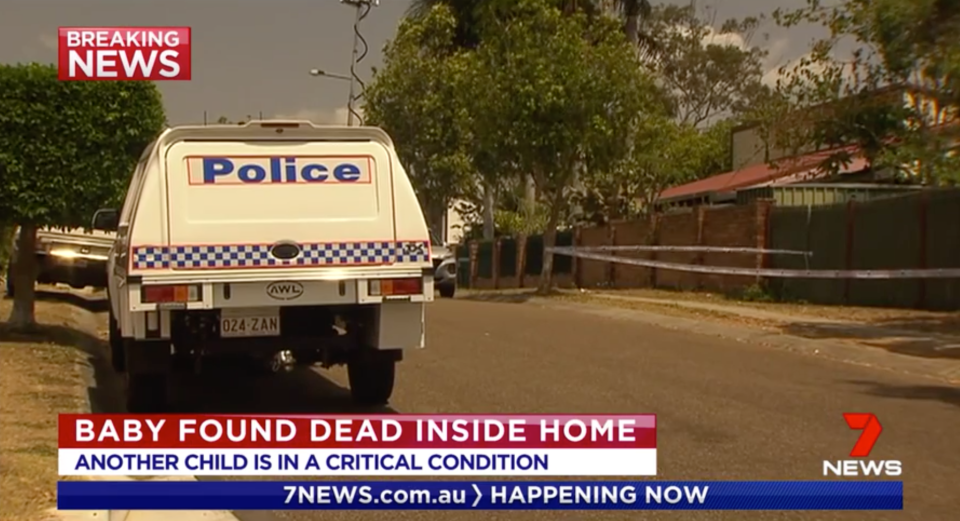 A police car parked on a street in Sunnybank Hills.