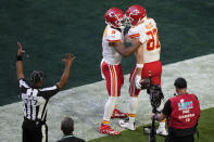 Kansas City Chiefs tight end Travis Kelce (87) celebrates his touchdown with wide receiver JuJu Smith-Schuster (9) during the first half of the NFL Super Bowl 57 football game against the Philadelphia Eagles, Sunday, Feb. 12, 2023, in Glendale, Ariz. (AP Photo/Charlie Riedel)