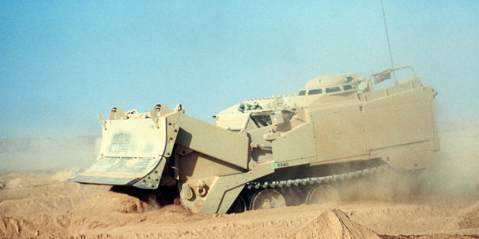 <p>Usually, earthmoving can be accomplished with a bulldozer. But if you're in a combat zone, a little more armor is important. That's were the M9 comes into play. And with an absurd 2362 lb.-ft. of torque available from its Cummins V903C, there isn't much that it can't move.</p>