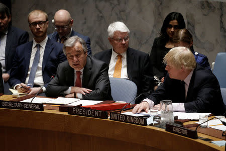 United Nations Secretary General Antonio Guterres addresses a meeting of the U.N. Security Council on South Sudan as British Foreign Secretary Boris Johnson (R) looks on at U.N. headquarters in New York City, New York, U.S. March 23, 2017. REUTERS/Mike Segar