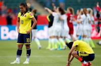 Jun 22, 2015; Edmonton, Alberta, CAN; Colombia midfielder Yoreli Rincon (10) reacts after the game against the United States in the round of sixteen in the FIFA 2015 women's World Cup soccer tournament at Commonwealth Stadium. Mandatory Credit: Michael Chow-USA TODAY Sports