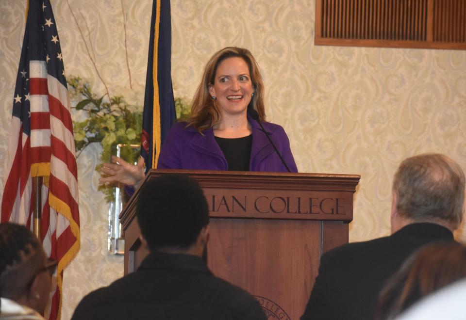 Michigan's Secretary of State Jocelyn Benson was a surprise guest speaker Monday, Jan. 15, 2024, during Adrian's annual Martin Luther King Jr. Day Celebration, held in the Tobias Center on the campus of Adrian College. Benson is pictured here delivering her address to a standing audience.