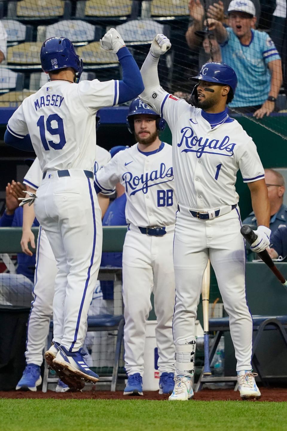 The Royals' Michael Massey (19) celebrates with MJ Melendez after hitting a home run in the seventh inning Monday night against the Brewers.