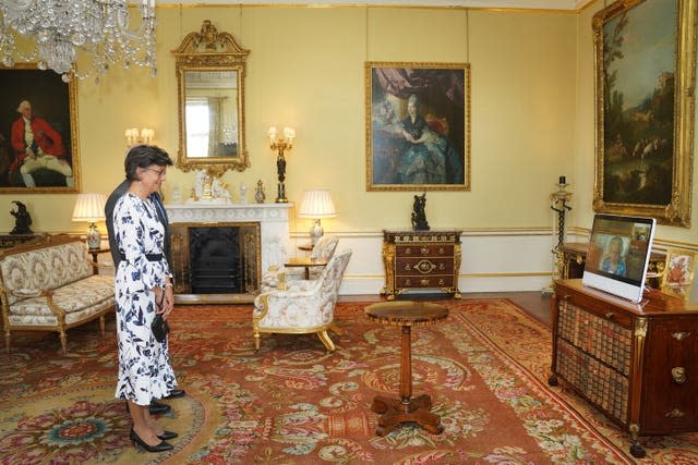 The Queen appears on a videolink from Windsor Castle to receive the High Commissioner for Belize, Therese Rath