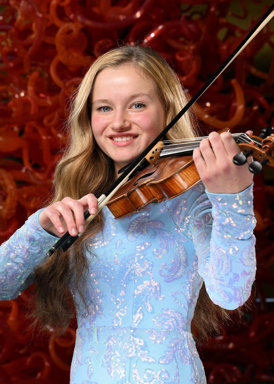 Whitney Baron, violinist, poses for photos for the 2023 Salute to Youth Portraits at Abravanel Hall in Salt Lake City on Wednesday, Oct. 4, 2023. | Scott G Winterton, Deseret News