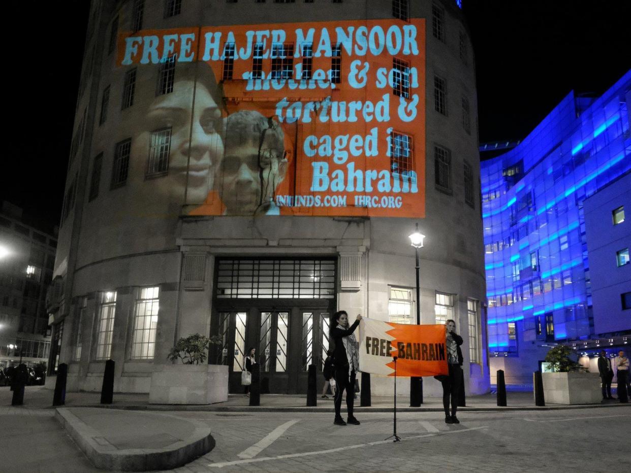 Projection of Hajar Mansoor with her son Sayed Nazar. The family is being targeted by Bahrain authorities in retribution for the human rights work of Sayed Ahmed Alwadaei: Alisdare Hickson