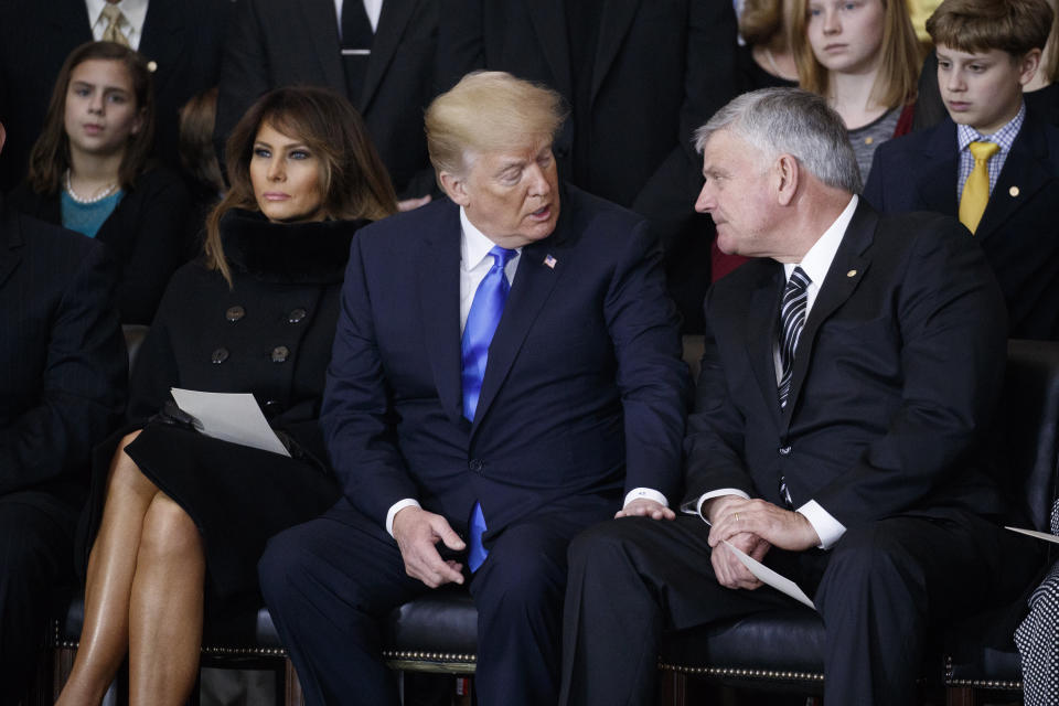 Franklin Graham with Trump at a ceremony honoring the late Billy Graham at the U.S. Capitol on Feb. 28. In an interview with the Christian Broadcasting Network, Franklin Graham said Blasey&rsquo;s allegation is&nbsp;&ldquo;not relevant.&rdquo; (Photo: Pool / Getty Images)