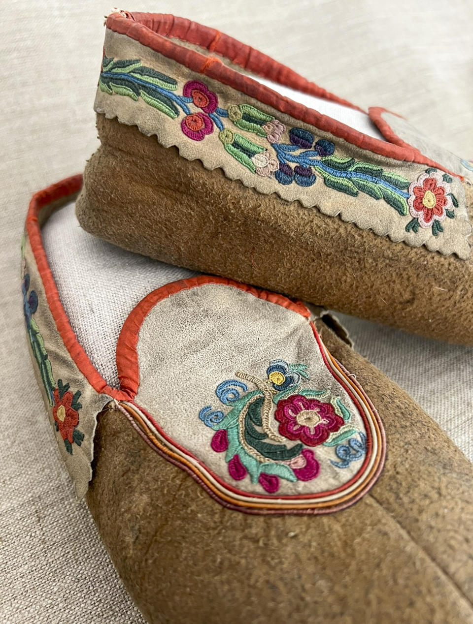 This undated photo provided on Wednesday, July 20, 2022, by Gregory Scofield, shows a pair of shoes he made in the late 19th-century Cree-Metif native Canadian traditional style. The Vatican's Anima Mundi Ethnological Museum houses tens of thousands of artifacts and art made by Indigenous peoples from around the world. The restitution of Indigenous and colonial-era artifacts, a pressing debate for museums and national collections across Europe, is one of the many agenda items awaiting Francis on his trip to Canada. (Gregory Scofield via AP)