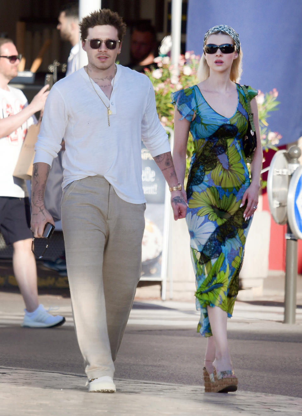 <p>Newlyweds Brooklyn Beckham and Nicola Peltz stroll around Saint-Tropez, France, on June 29. </p>