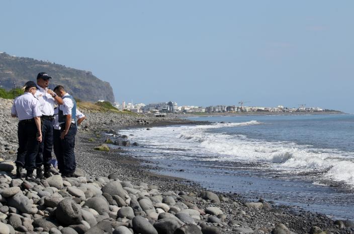 Several pieces of debris found on a beach on La Reunion island on August 2, 2015 sparked excitement as one was believed by locals to be from a plane door (AFP Photo/Richard Bouhet)