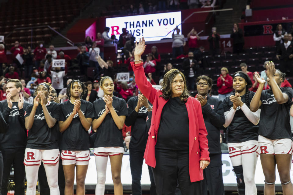 Former Rutgers head coach, C. Vivian Stringer, is honored at a ceremony during half time at the Big Ten Conference women's college basketball game between the Rutgers Scarlet Knights and the Ohio State Buckeyes in Piscataway, N.J., Sunday, Dec. 4, 2022. (AP Photo/Stefan Jeremiah)