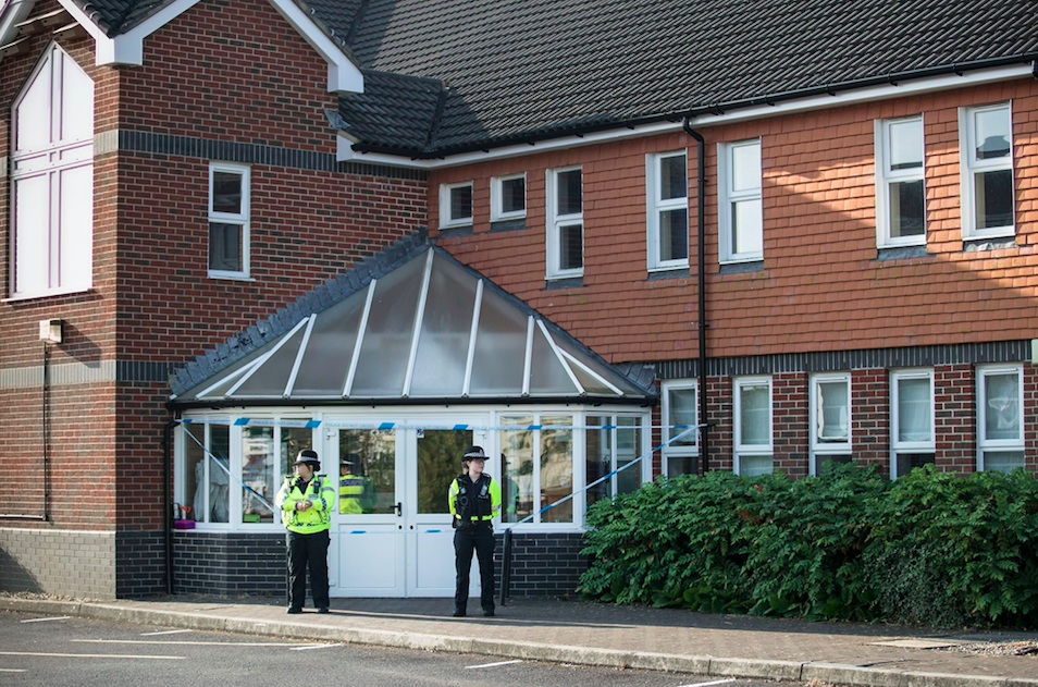 <em>Police guard the the Amesbury Baptist Church, where it is believed the pair visited before falling ill (Rex)</em>