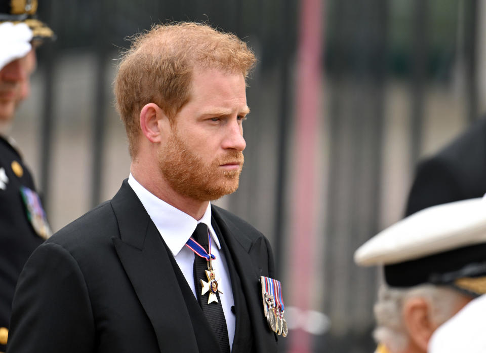 LONDON, ENGLAND - SEPTEMBER 19: Prince Harry, Duke of Sussex during the State Funeral of Queen Elizabeth II at Westminster Abbey on September 19, 2022 in London, England. Elizabeth Alexandra Mary Windsor was born in Bruton Street, Mayfair, London on 21 April 1926. She married Prince Philip in 1947 and ascended the throne of the United Kingdom and Commonwealth on 6 February 1952 after the death of her Father, King George VI. Queen Elizabeth II died at Balmoral Castle in Scotland on September 8, 2022, and is succeeded by her eldest son, King Charles III. (Photo by Karwai Tang/WireImage)