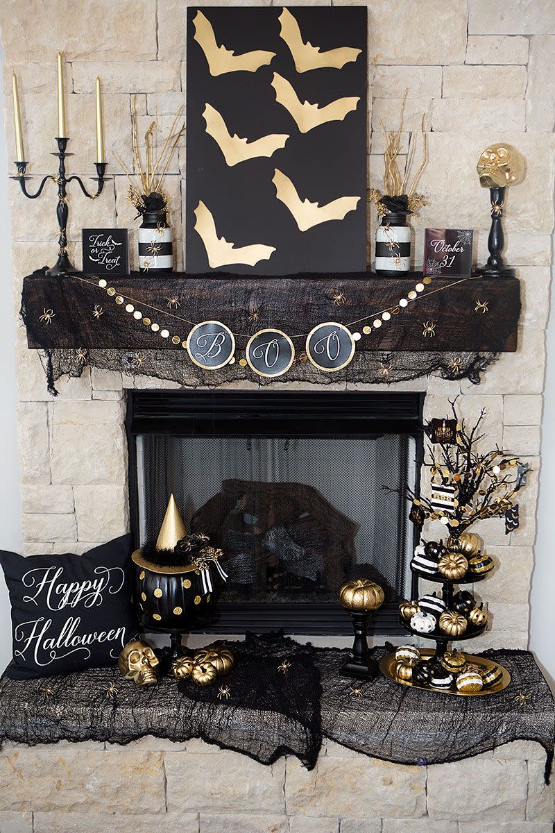 <p>Go ahead and invest in some gold spray paint! This Halloween mantel goes glam for the holidays, without sacrificing the overall sophisticated aesthetic of your living room.</p><p><strong>See more at <a href="https://ablissfulnest.com/halloween-mantel-ideas/" rel="nofollow noopener" target="_blank" data-ylk="slk:A Blissful Nest;elm:context_link;itc:0;sec:content-canvas" class="link ">A Blissful Nest</a>.</strong></p>