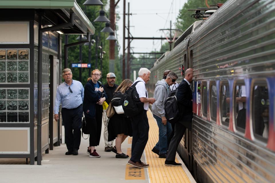 Passengers board a southbound train on SEPTA's West Trenton regional rail line at the Yardley station on Monday, June 12, 2023.