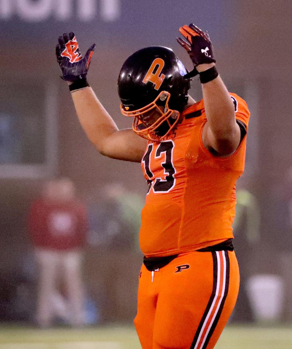 South Pittsburg's tight end Martavious Collins (13) pumps up the crown in the 4th quarter of the TSSAA BlueCross Bowl Division I Class 1A Championship game against McKenzie at Finley Stadium in Chattanooga, Tenn. on Friday, Dec. 1, 2023.