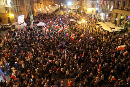 People attend a protest against judicial reforms in Warsaw, Poland, July 26, 2017. Agencja Gazeta/Mieczyslaw Michalak via REUTERS