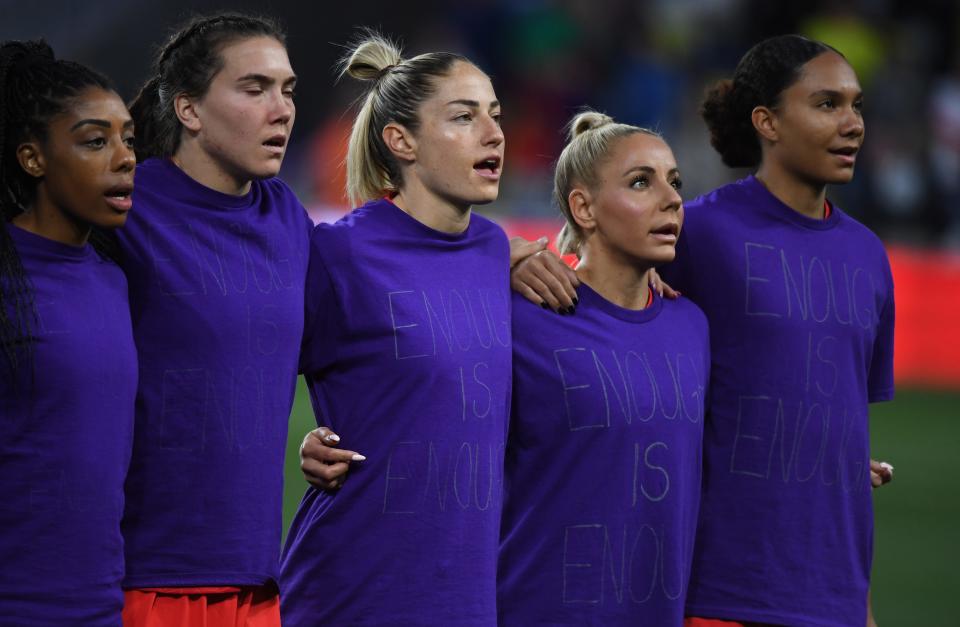 Canada players wear "enough is enough" shirts during the national anthem before the match against Brazil at Geodis Park during the SheBelieves Cup on Feb. 19, 2023.