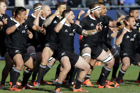 Cabin crew investigated after 'cuddling' All Blacks on way home to NZ